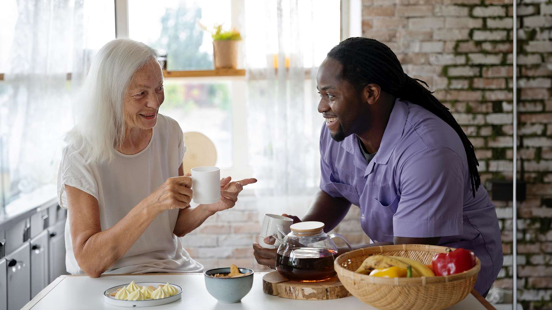 A caregiver from Legacy Homecare LA is assisting a person with Parkinson's disease during mealtime, focusing on managing dysphagia. The image highlights the importance of specialized caregiving for individuals with Parkinson's, particularly in dealing with swallowing difficulties and promoting proper nutrition.