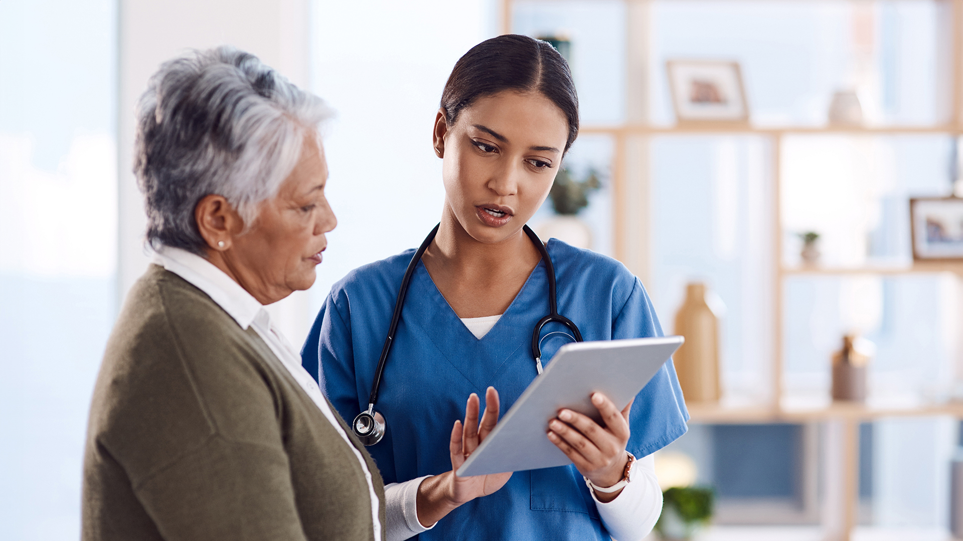 A dedicated caregiver from Legacy Homecare LA assisting a senior client in their home, promoting comfort and personalized care in Los Angeles County.