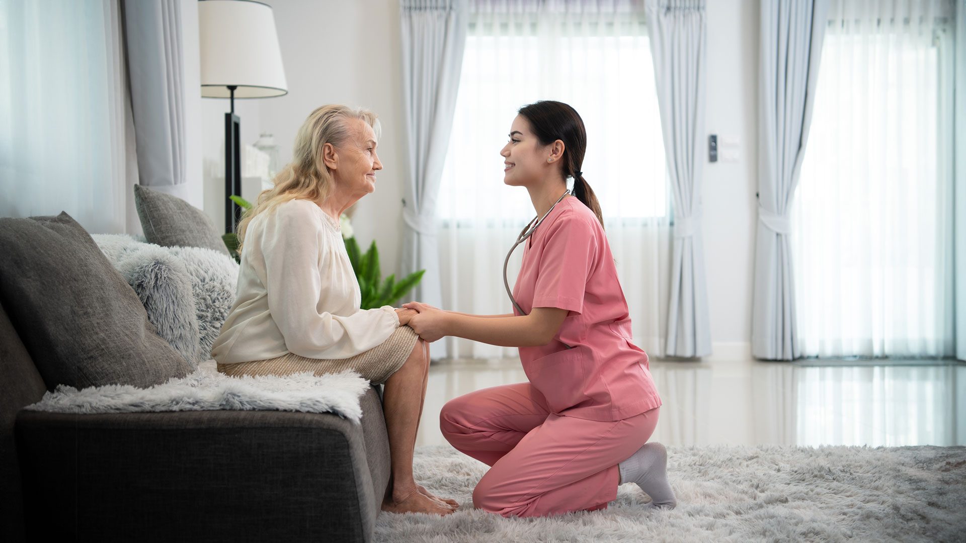 Caregiver from Legacy Homecare LA providing personalized assistance to a senior, emphasizing the benefits of maintaining a structured daily routine for individuals facing health challenges like Parkinson's and Alzheimer's, ensuring their stability and well-being within the comfort of their Los Angeles home.